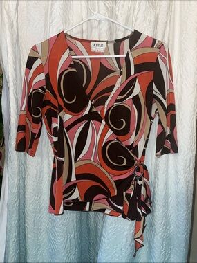 A. Byer Pink, Brown & Cream Swirl Wrap Top